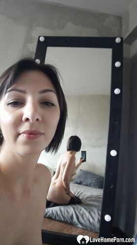 Office worker taking some nudes at home