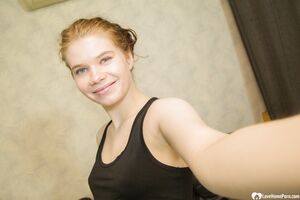 Pregnant amateur girl shows off her belly