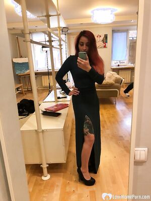 Redhead with nice tits and sexy tattoos