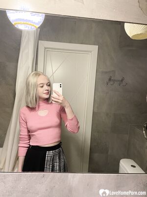 Tattooed blonde showing off her sexy tattoos