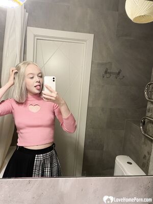 Tattooed blonde showing off her sexy tattoos