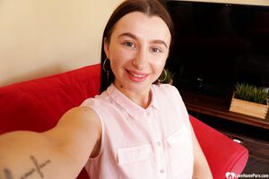 Cute brunette shows off her petite curves