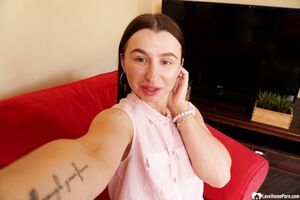 Cute brunette shows off her petite curves