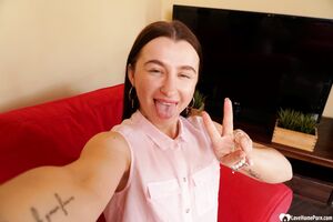 Cute brunette shows off her petite curves