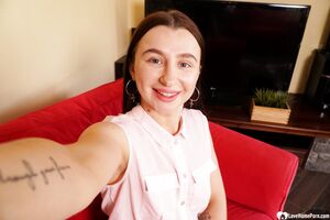 Cute brunette shows off her petite curves