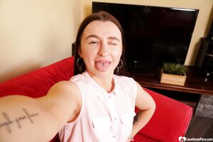 Cute brunette shows off her petite curves