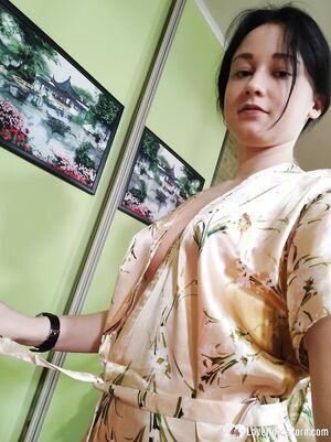 Cute babe posing in her white stockings