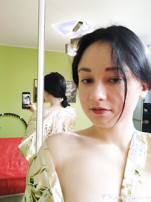 Cute babe posing in her white stockings