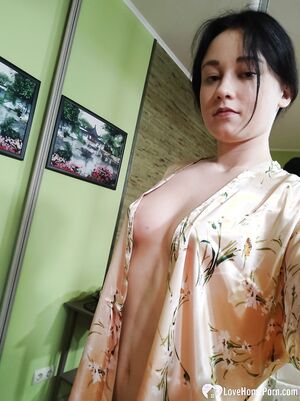 Cute babe posing in her white stockings