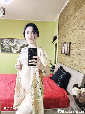 Cute babe posing in her white stockings