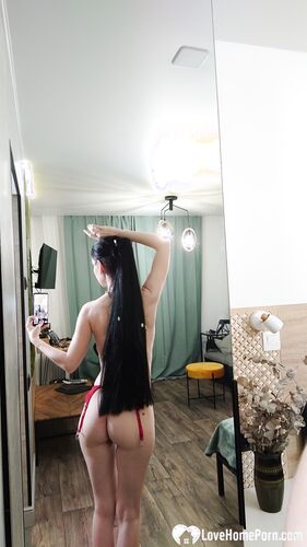 Sexy teacher taking some naughty photos for you