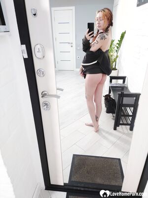 Petite cutie with small tits takes selfies