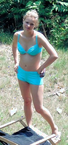 amateur teen posing outdoors