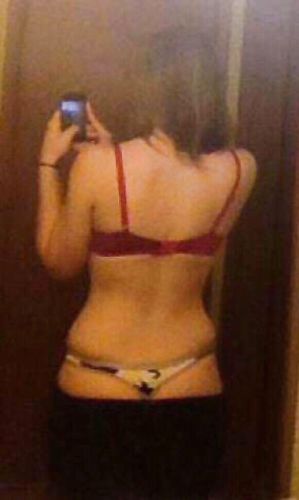 Sexpot showing off her thongs and titties