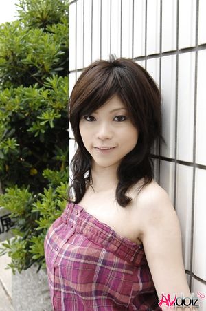 Asian Kurumi Katase is beautiful like a flower between flowers.