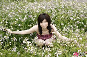 Asian Kurumi Katase is beautiful like a flower between flowers.