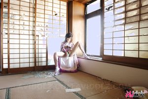 Asian Chiaki fucks her hairy pussy with toys under colorful kimono.