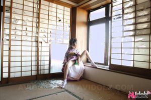 Asian Chiaki fucks her hairy pussy with toys under colorful kimono.