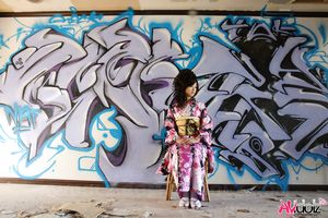 Asian Chiaki sucks cock showing her sexy legs under colorful kimono.