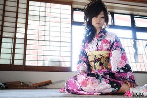 Chiaki in kimono spreads legs and shows hairy pussy on the floor.