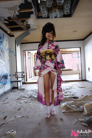 Asian Chiaki undresses kimono and shows her body in abandoned place.