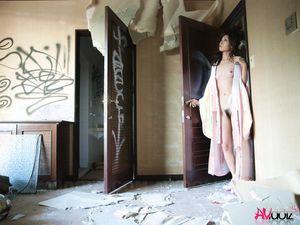 Asian Chiaki undresses kimono and shows her body in abandoned place.