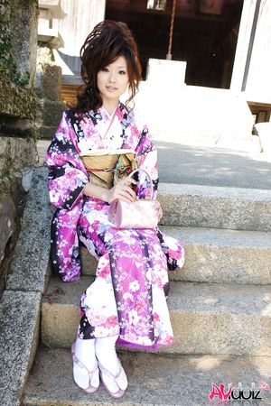 Asian Chiaki wearing a beautiful kimono visits different places.