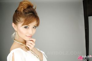 Hot Akane Hotaru in white blouse, shorts and high heels loves posing.