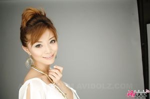 Hot Akane Hotaru in white blouse, shorts and high heels loves posing.