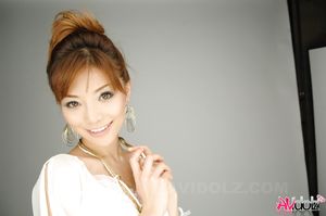 Hot Akane Hotaru in white blouse, shorts and high heels loves posing.