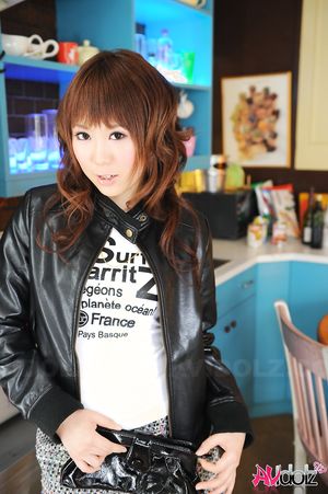 Asian Yuko Morita is so fashionable in short skirt and blue tights.