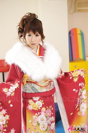 Asian Yuko Morita looks fantastic in a kimono and with a fur collar.