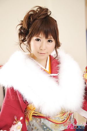 Asian Yuko Morita looks fantastic in a kimono and with a fur collar.
