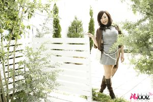 Yuki Motoyama in a tight dress looks amazing at the photo session.