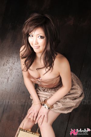 Busty Sayuri Ito wears an elegant dress at this amazing photo session.