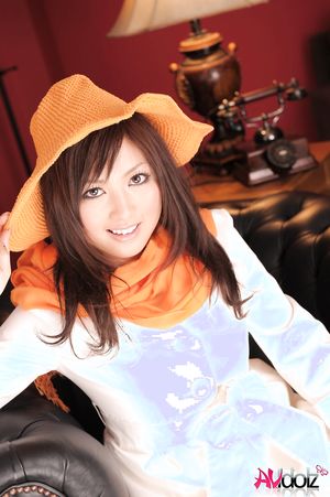 Sayuri Ito in white coat and high heels shows sexy legs when posing.