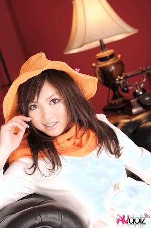 Sayuri Ito in white coat and high heels shows sexy legs when posing.