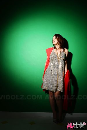 Rui Natsukawa is elegant and daring while posing in a silver dress.