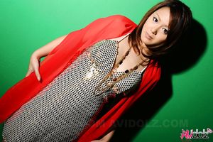 Rui Natsukawa is elegant and daring while posing in a silver dress.