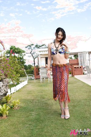 Superb Asian Risa shows her sexy curves in bath suit at the pool.