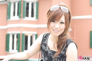 Riru Ozawa with a beautiful smile is happy to have a walk in the city.