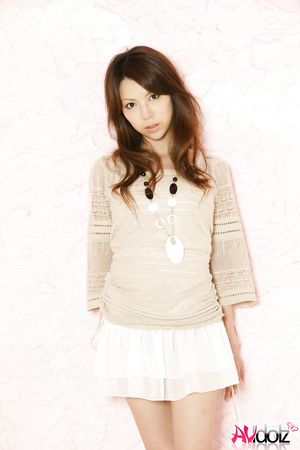 Asian Rino Tokiwa is so beautiful in white skirt and elegant blouse.