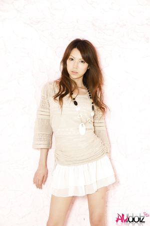 Asian Rino Tokiwa is so beautiful in white skirt and elegant blouse.