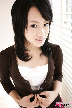 Mio Kanna shows big boobs and pussy in thong while undressing at cam.