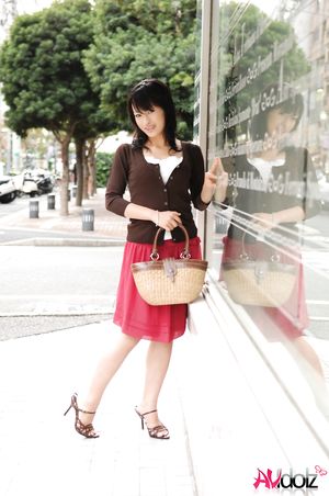 Mio Kanna is so elegant and sexy in red and black outfit while posing.