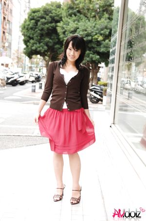 Mio Kanna is so elegant and sexy in red and black outfit while posing.