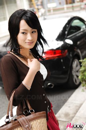 Mio Kanna is so elegant and sexy in red and black outfit while posing.
