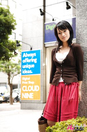 Mio Kanna is so elegant and sexy in red and black outfit while posing.