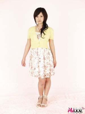 Minako Oyama is a cute Asian girl posing in a very sweet outfit.