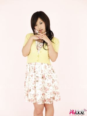 Minako Oyama is a cute Asian girl posing in a very sweet outfit.
